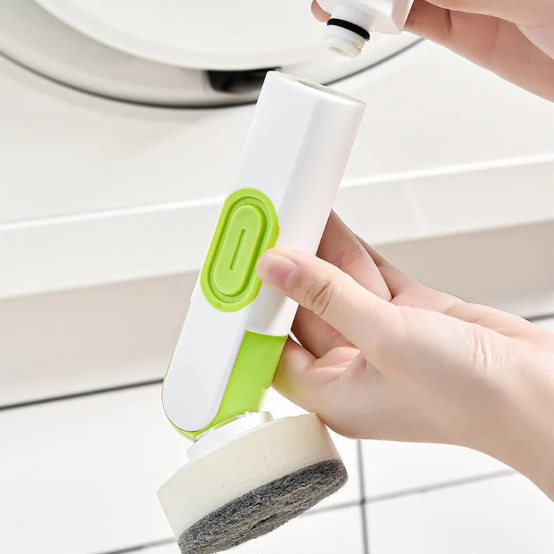 White and red long-handle kitchen brush with soap dispenser button and two interchangeable scrub heads on a hook.