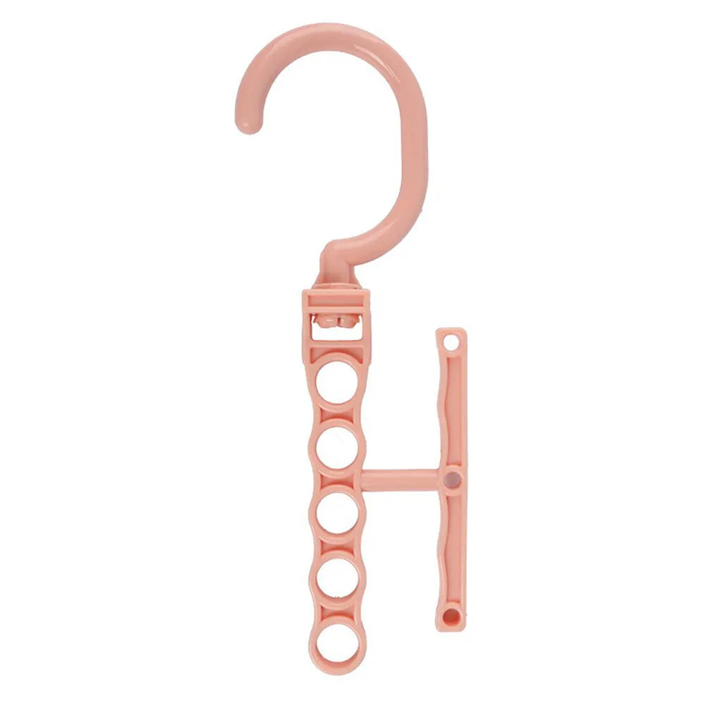 Blue revolving wardrobe hanger with five branches and a handle for multiple garment organisation.