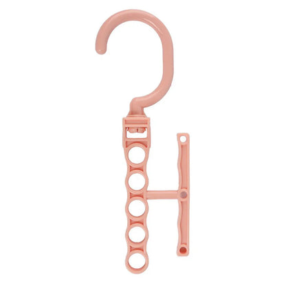 Blue revolving wardrobe hanger with five branches and a handle for multiple garment organisation.