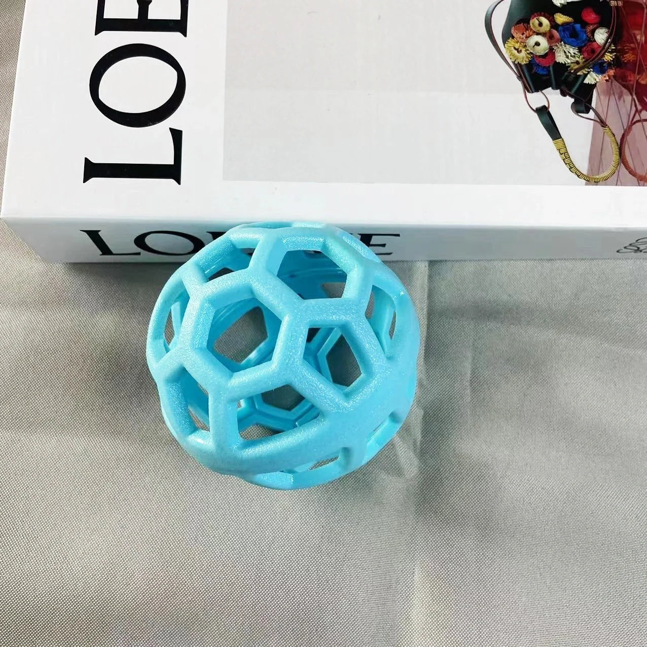 TPR dog chew ball toy in various colours for interactive play and dental health