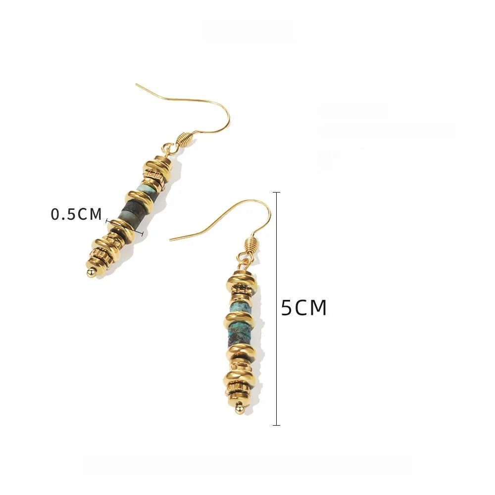 Geometric titanium steel dangle earrings with 18K gold plating on a white background.