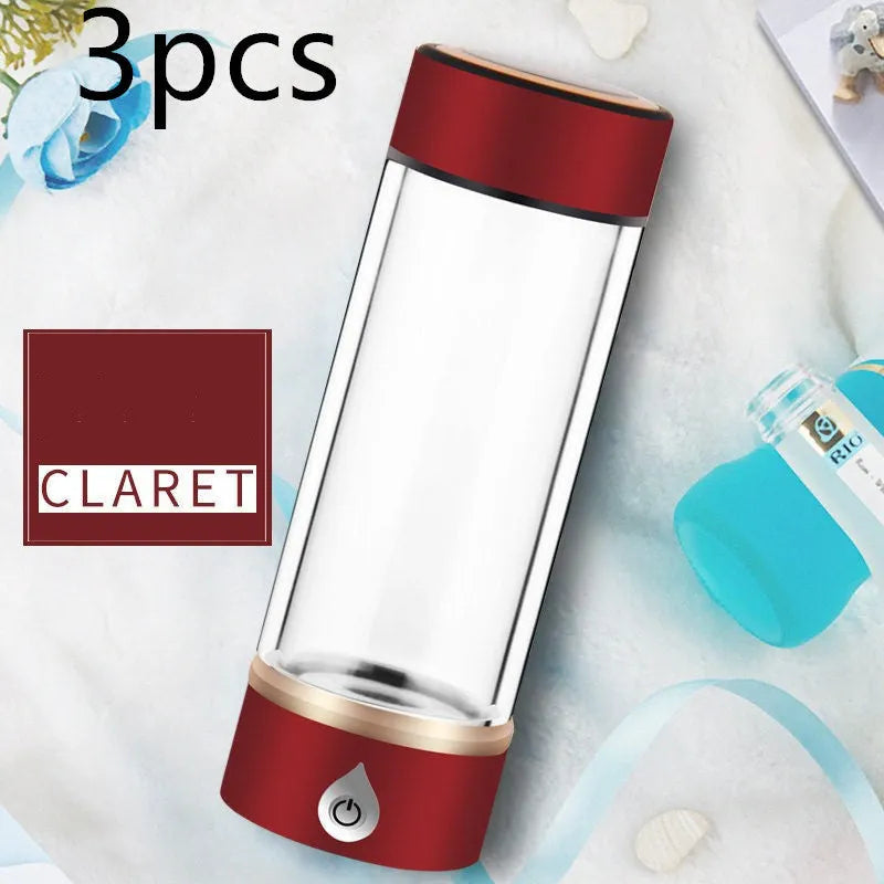 Portable hydrogen water ionizer bottle with high borosilicate glass cup in silver finish.