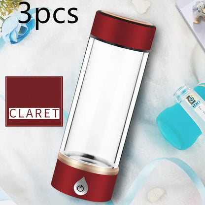 Portable hydrogen water ionizer bottle with high borosilicate glass cup in silver finish.