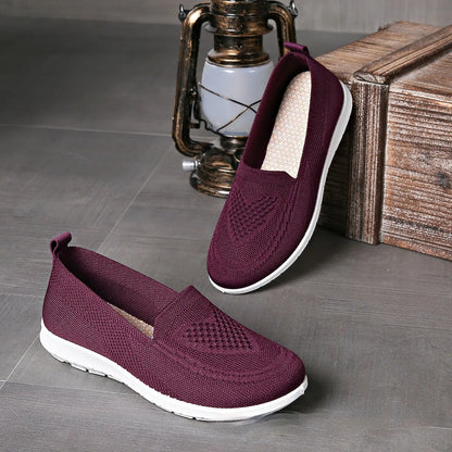 Plus size women's beige casual cloth shoes with low top, flat heel, and heart pattern.