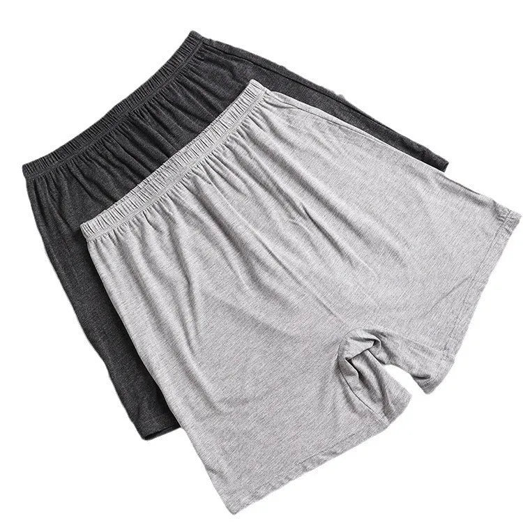 Men's solid colour high-waist boxers in modal fabric laid flat.