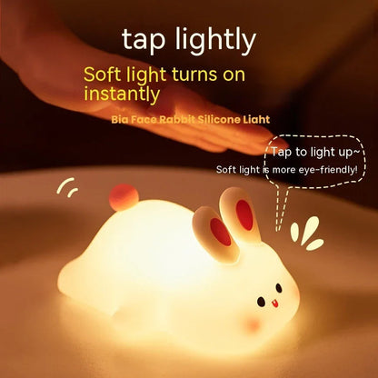 Adorable LED night light with soft silicone design and rabbit face, perfect for kids' bedrooms