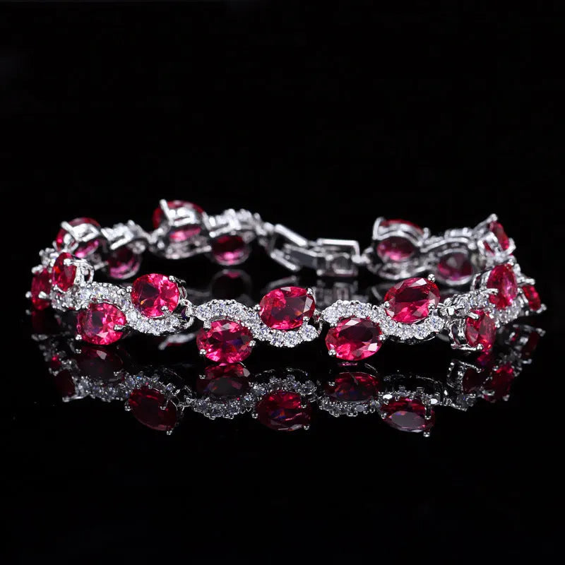 Copper-plated gold bracelet with AAA+ zircon stones in simple geometry style measuring 18.4cm length