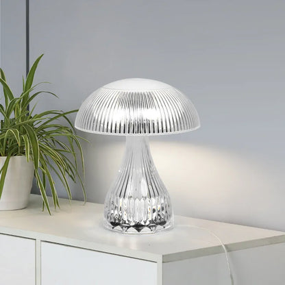 Small white acrylic USB rechargeable table lamp with a three-colour LED light.
