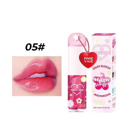 Colour-changing lip gloss with love pendant charm on applicator, from the Princess series.
