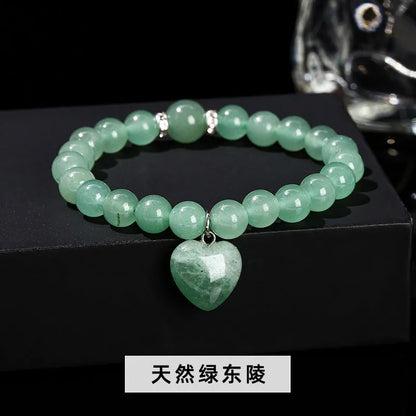 Handmade natural crystal bracelet with tigereye, aventurine, pink crystal, white jade and unakite stones