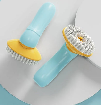 Blue hand-held pet bath brush with soft bristles for dog and cat grooming.