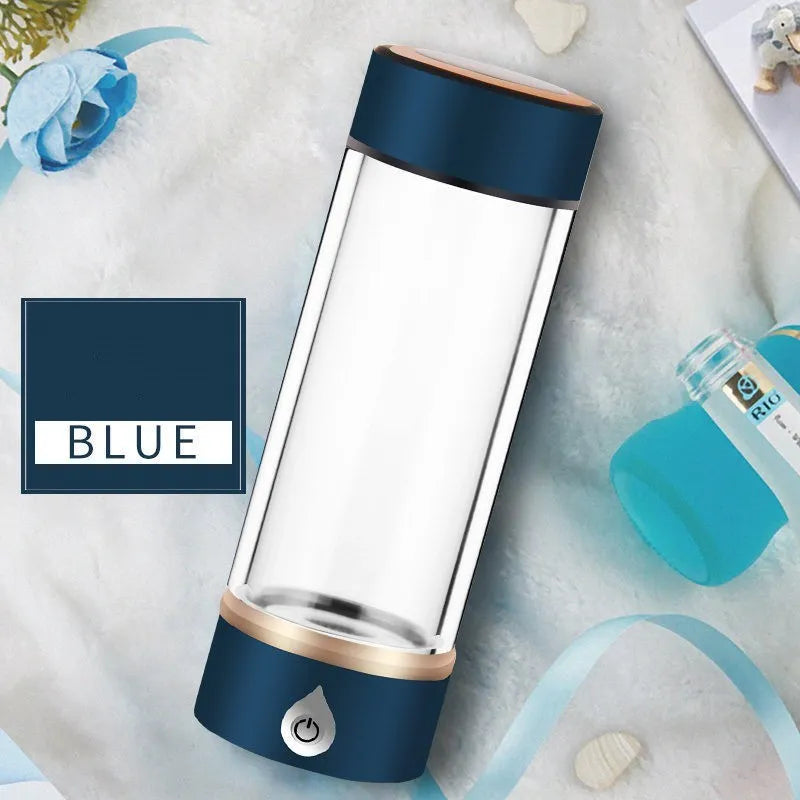Portable hydrogen water ionizer bottle with high borosilicate glass cup in silver finish.
