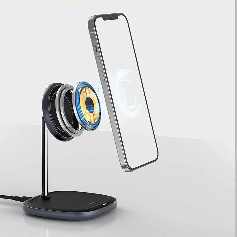 Swan Magnetic Desktop Stand Wireless Charger in white holding an iPhone 12 at an angle on a wooden desk