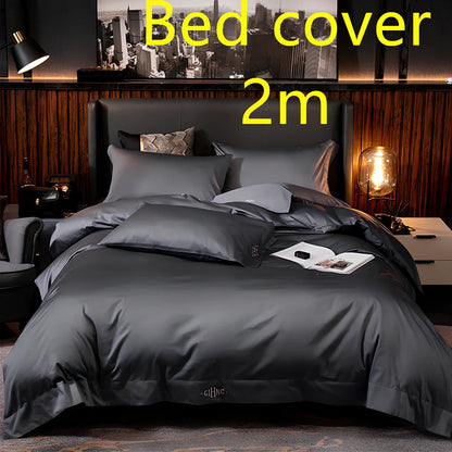 Four-piece cotton bedding set with satin weave fabric showing quilting detail and colour options