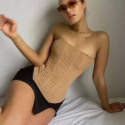 Sleeveless crop top for women with unique mesh and corset design, available in black, khaki, and white colors