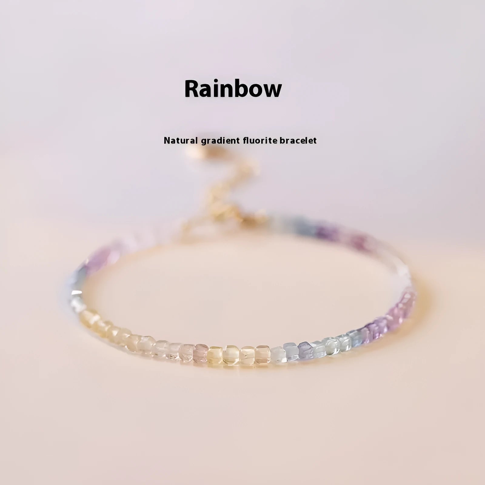 Handmade women's bracelet with rainbow fluorite stone in geometric copper links.
