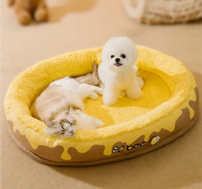 Grey washable dog bed with a detachable cover shown next to a yellow one, sized for a small to medium dog.