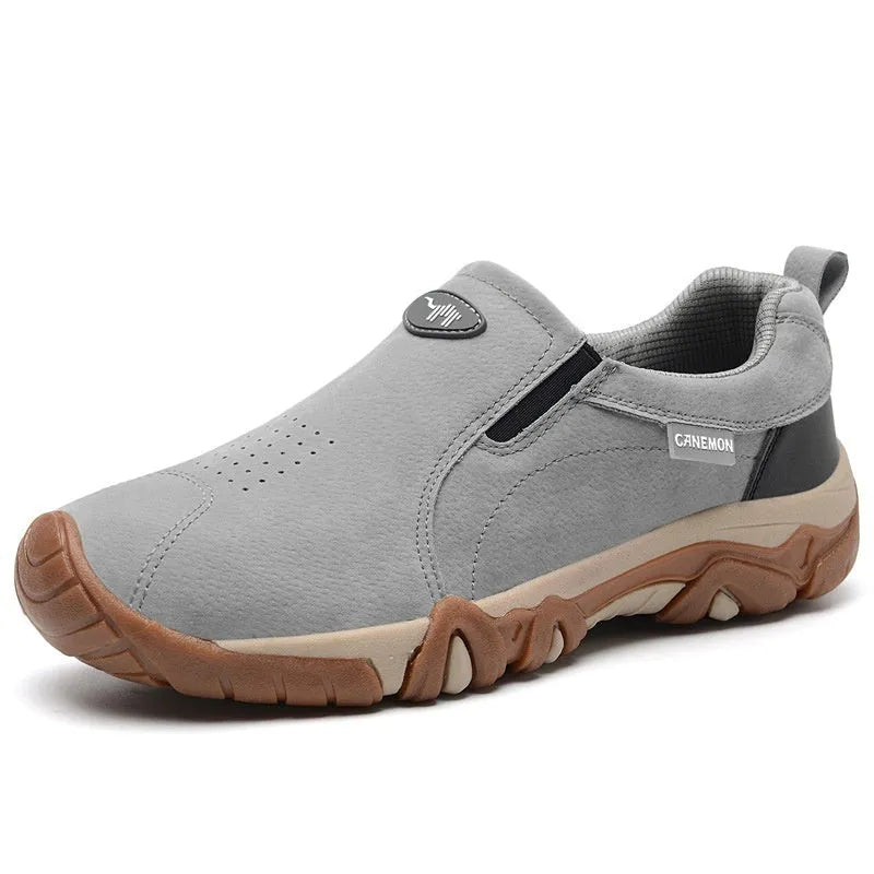 Men's suede low-top casual shoes in khaki with a rubber sole and mesh lining, shown on a white background.