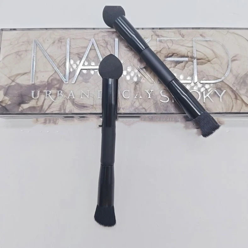 Black sponge stick concealer brush with wooden handle and tapered tip for dark circle coverage