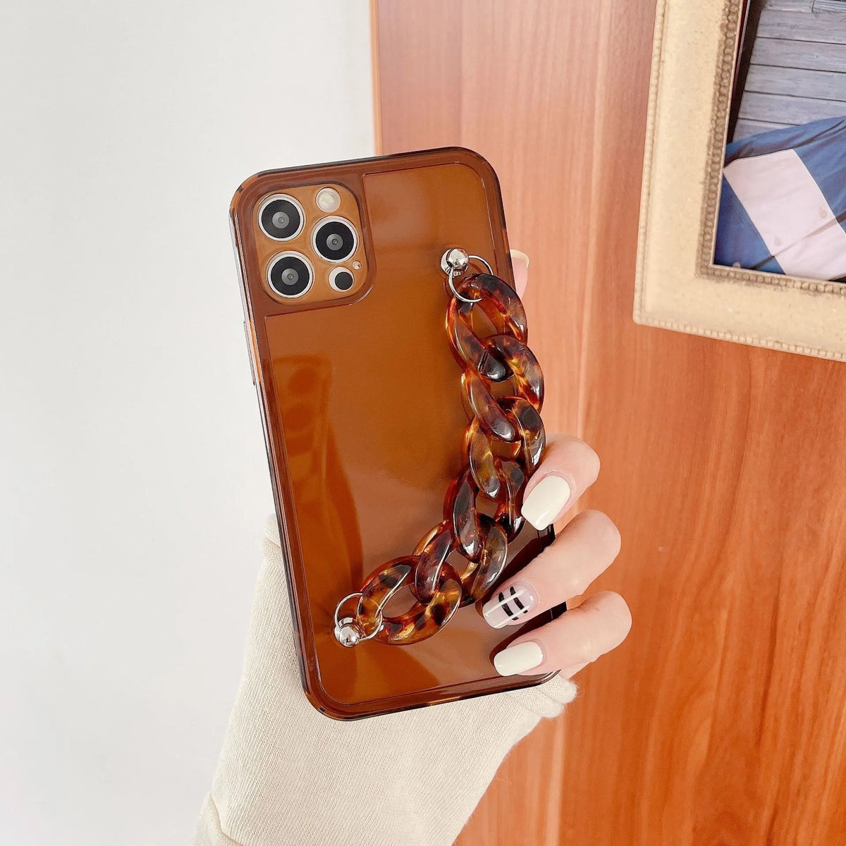 Marble pattern silicone phone case for iPhone with attached TPU bracelet, shown in grey blue colour.