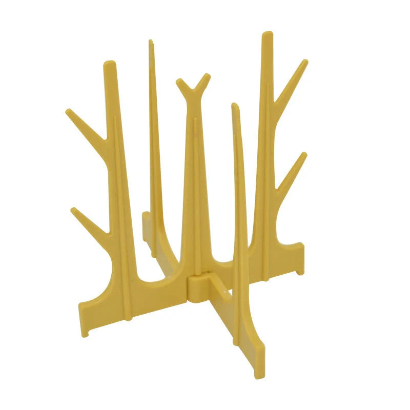 Creative Tree Branch Bottle Drying Rack for baby feeding bottles and accessories in blue, yellow, white, and nude