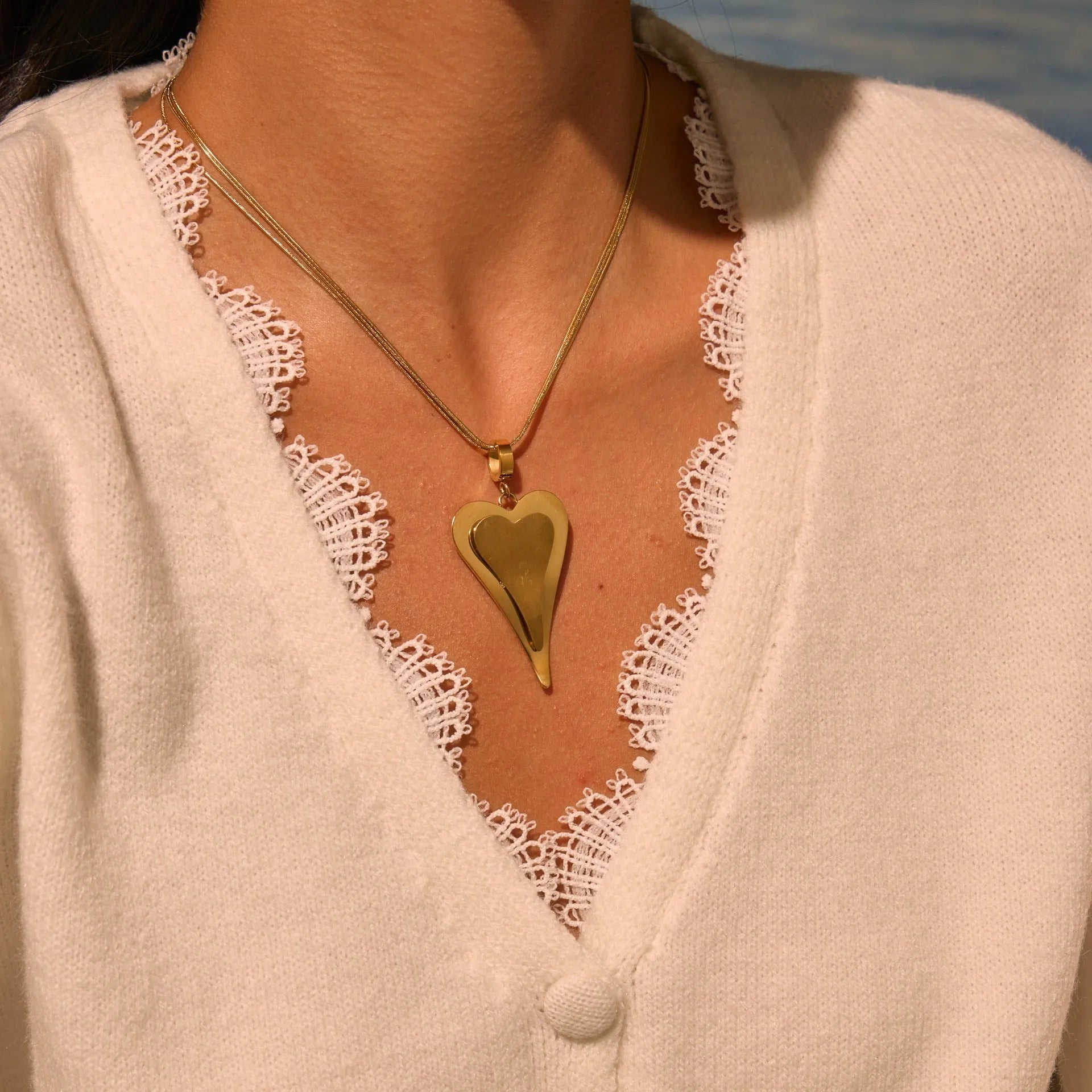 Stainless steel geometric necklace with double heart snake bones pendant in gold or steel colour