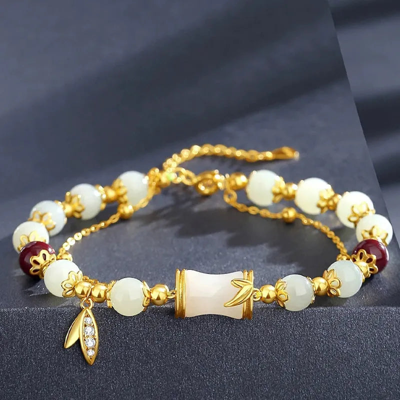 Retro bamboo design bracelet with floral shape and ruyi element in glass and coloured glaze
