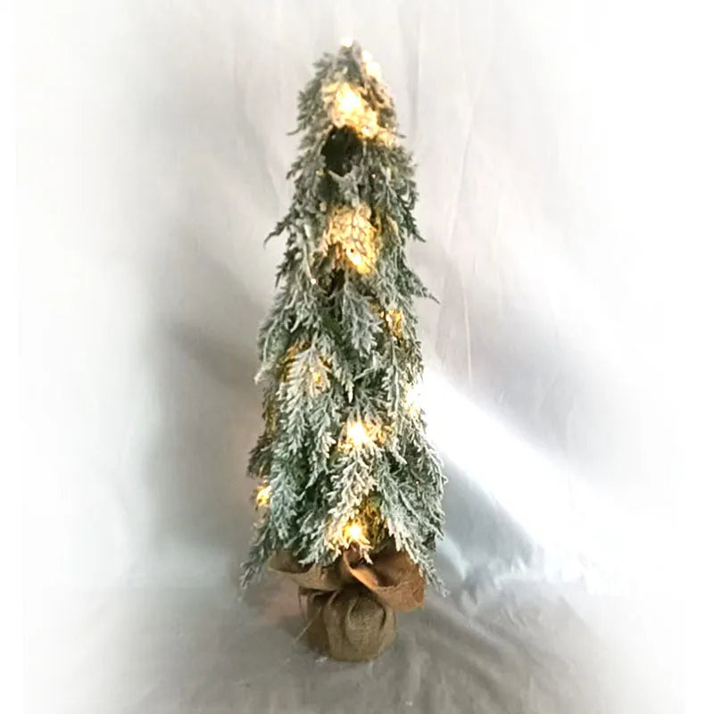 24-inch desktop Christmas tree with PE snow sprayer texture and built-in lights on plastic branches
