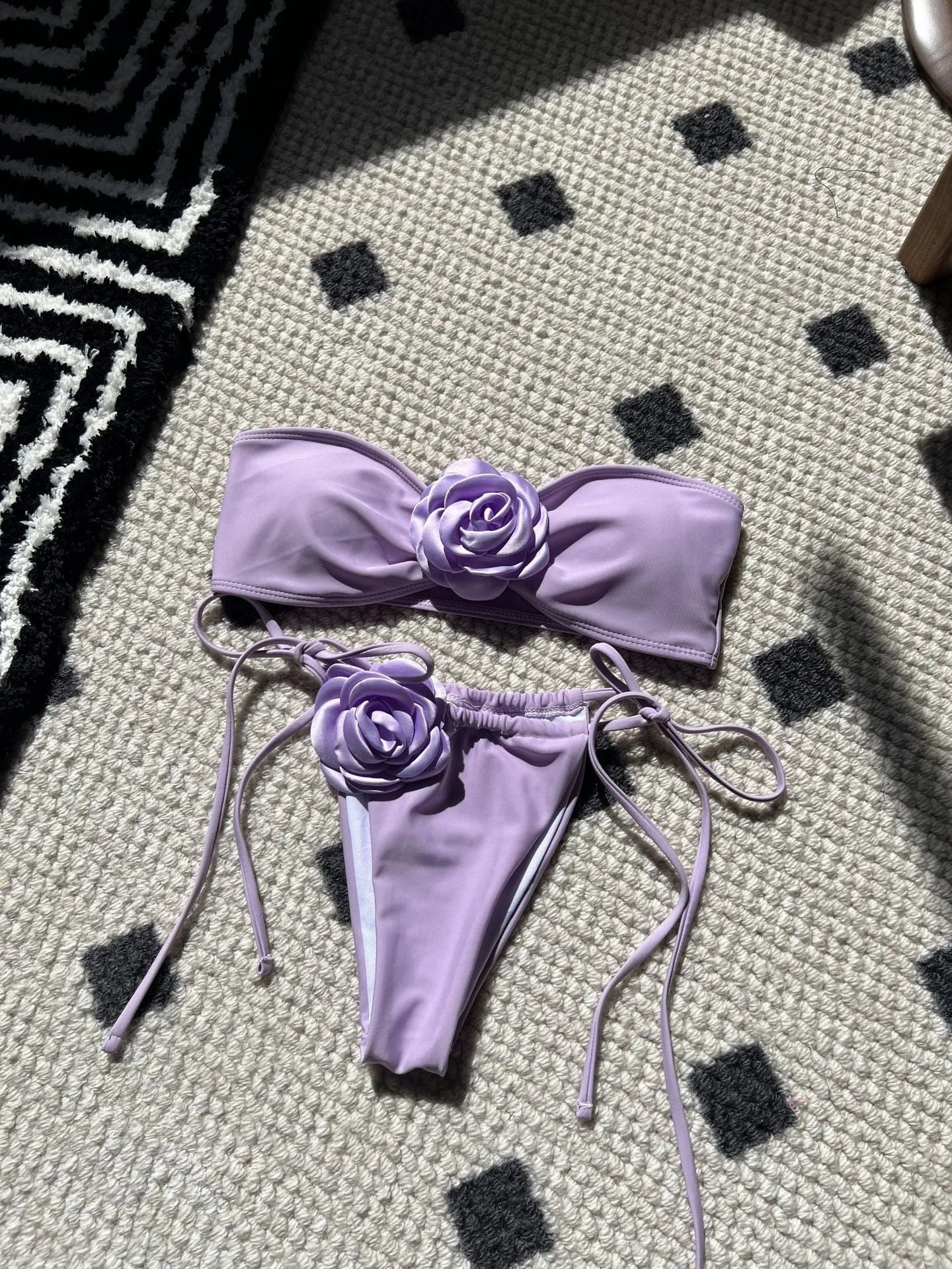Women's solid colour drawstring tube top swimsuit in brief style, shown in one of nine available colours.