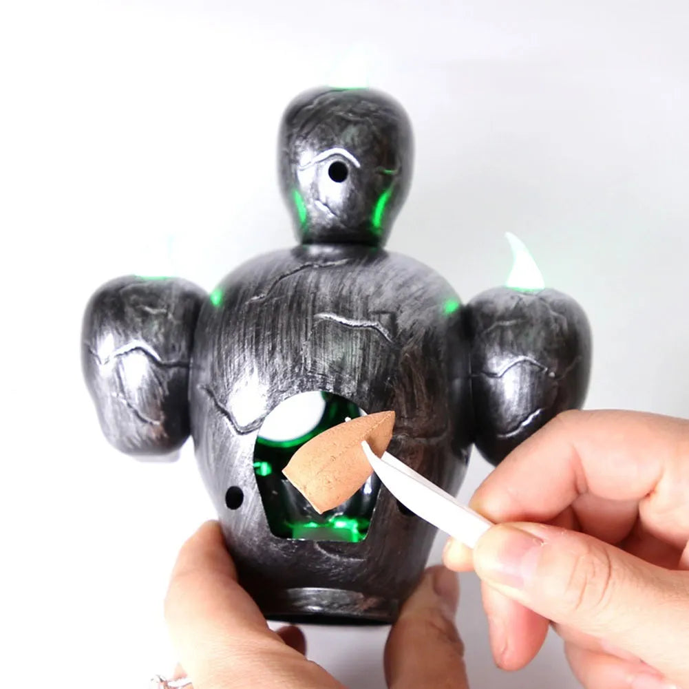 Gold and silver plastic Halloween skull ornament with LED lights for indoor decoration