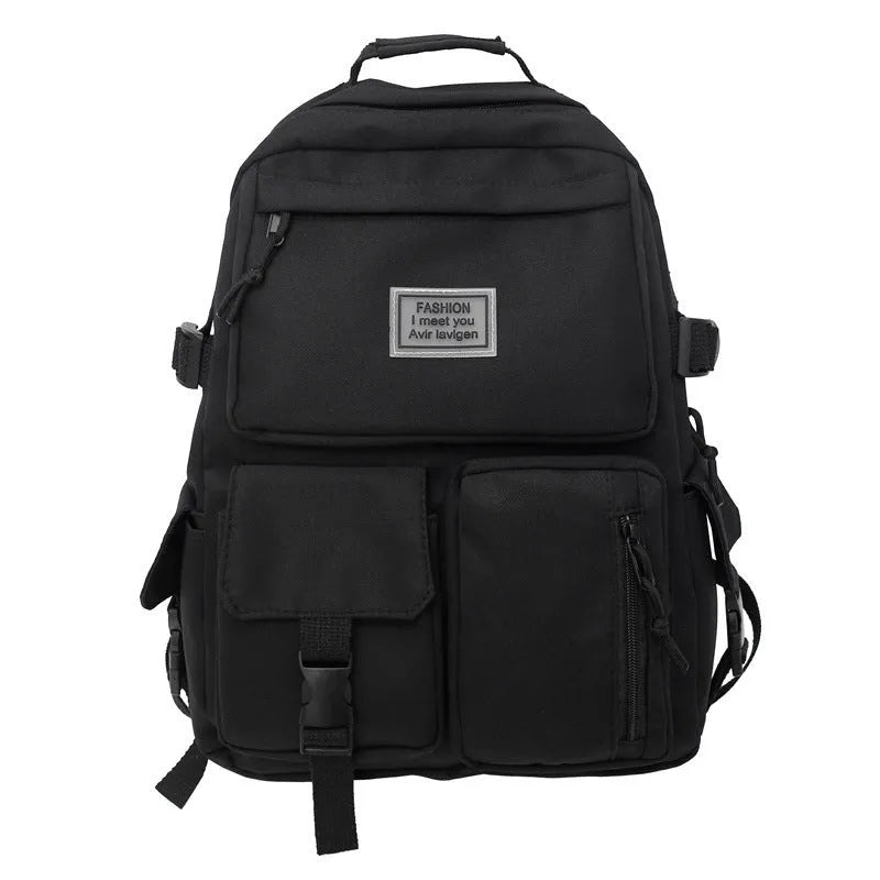 Black and white nylon student backpack with laptop compartment and three-dimensional pocket.
