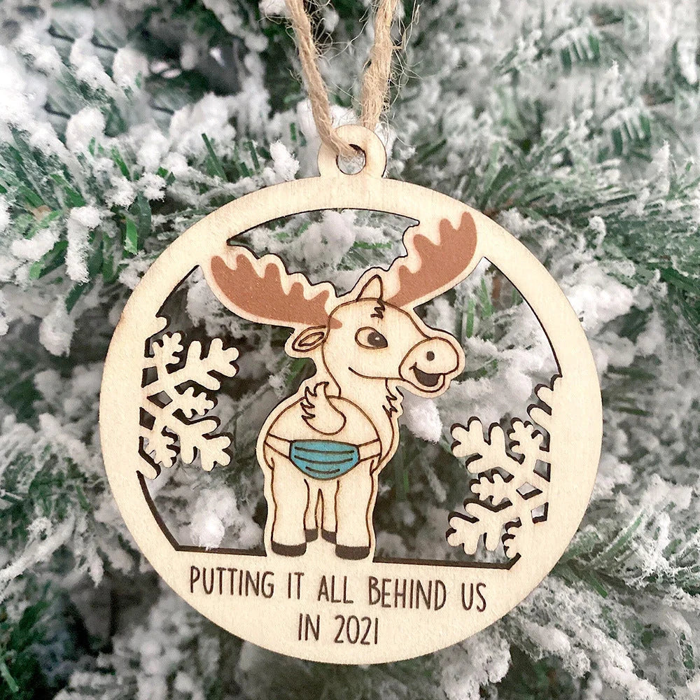 Laser-cut wooden Christmas tree pendant with lovers, snowman, and deer designs