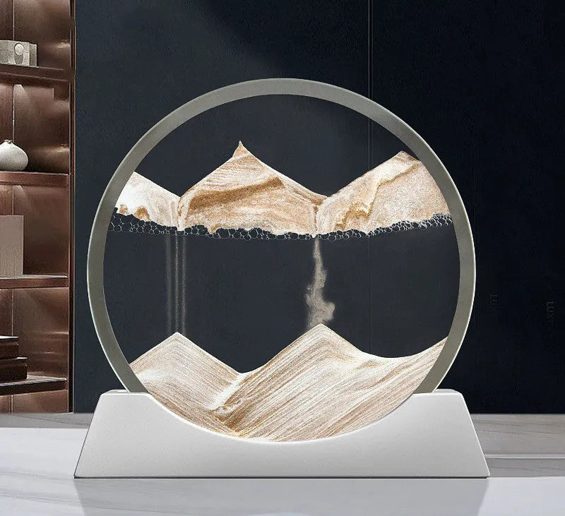 Modern abstract quicksand painting rotary night lamp in blue, 12 inches tall on a desktop.