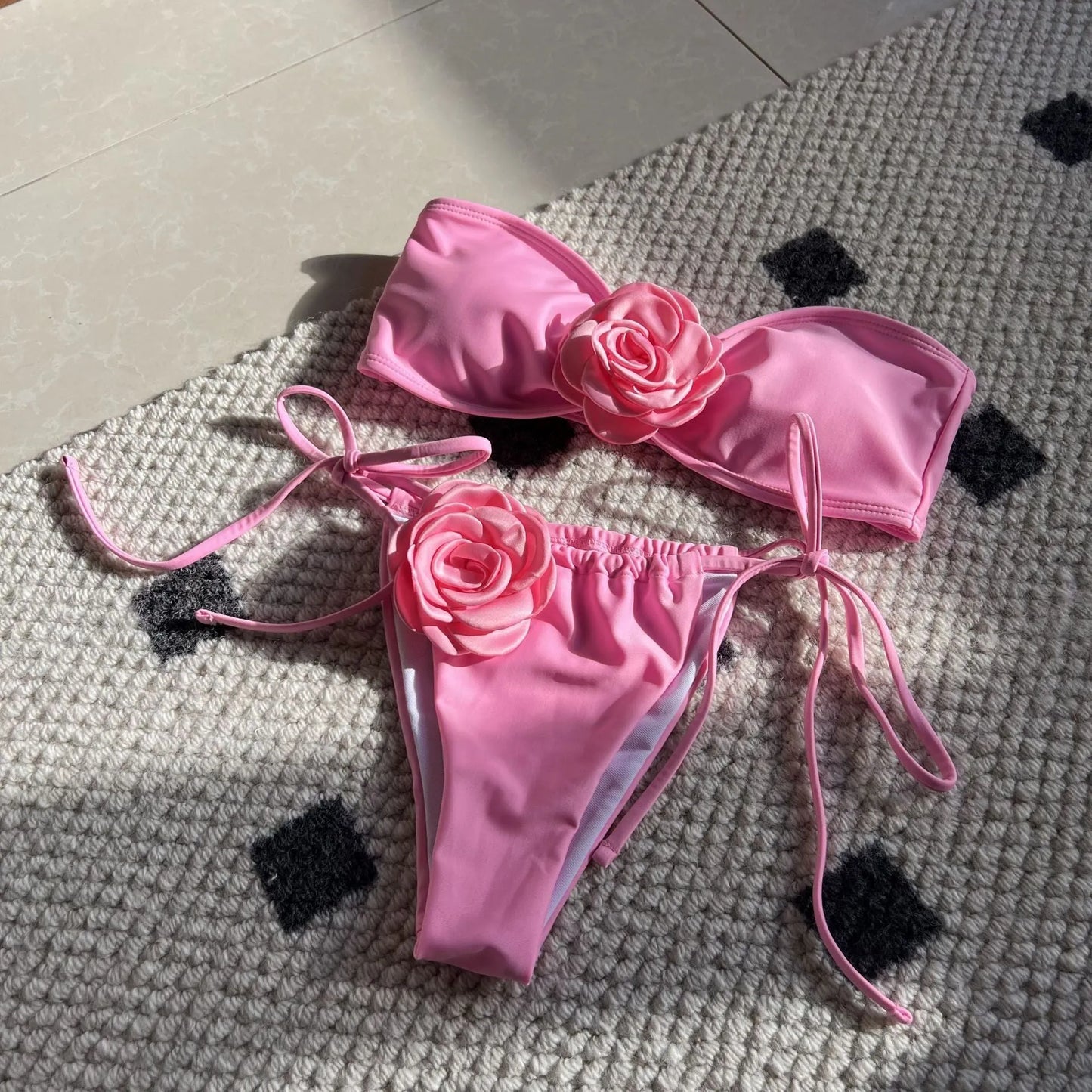 Women's solid colour drawstring tube top swimsuit in brief style, shown in one of nine available colours.