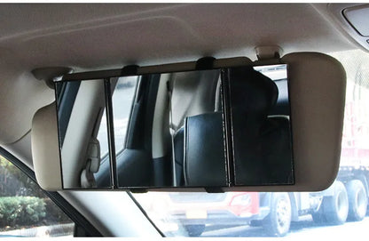 Silver car folding makeup mirror shown in opened position measuring 30.5cm wide
