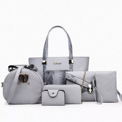 Women's shoulder bag with zipper closure and multiple pockets in light grey, black, off-white, and rose red