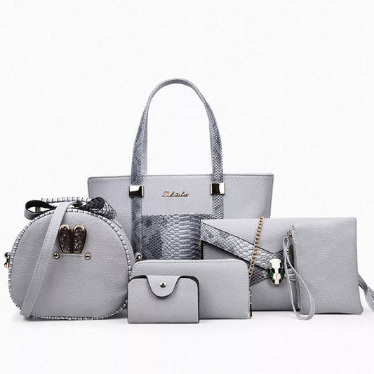 Women's shoulder bag with zipper closure and multiple pockets in light grey, black, off-white, and rose red