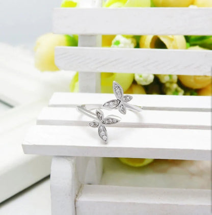 Elegant sterling silver adjustable butterfly ring with gem embellishments