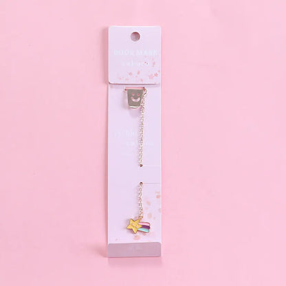 Alloy metal cartoon pendant bookmark with colourful charms including panda, rocket, and wishing bottle designs