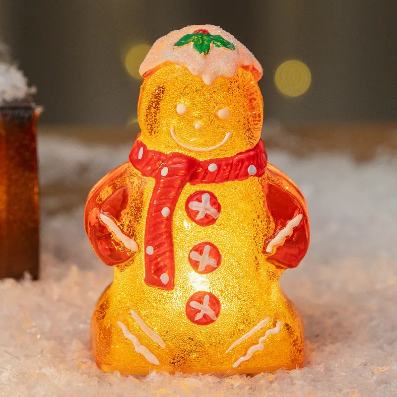 Glowing Christmas gingerbread man and snowman ornaments with LED lights in red, white, and transparent scarf variations