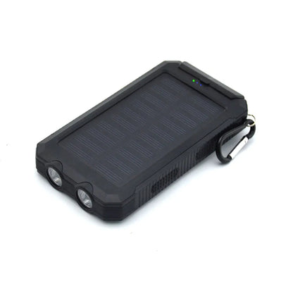 Black solar power bank with compass display and dual LED lights, showing 20000mAh capacity label.