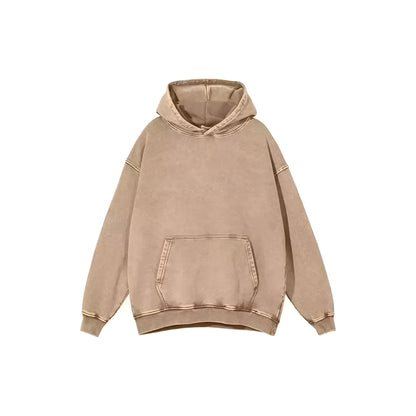 Man wearing a loose, collarless cotton hoodie with a batik-washed texture in a brown colour.