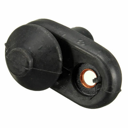 Black universal car interior door light switch made of plastic and metal.
