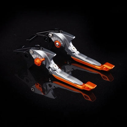 Pair of anodised metal bicycle brake horn handle levers with adjustable reach, shown in a two-tone colour finish.