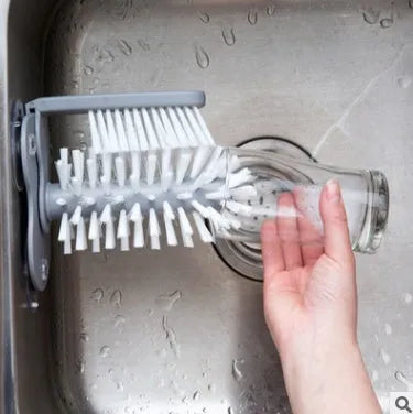 Grey suction cup brush with double-head design for cleaning cups and glasses