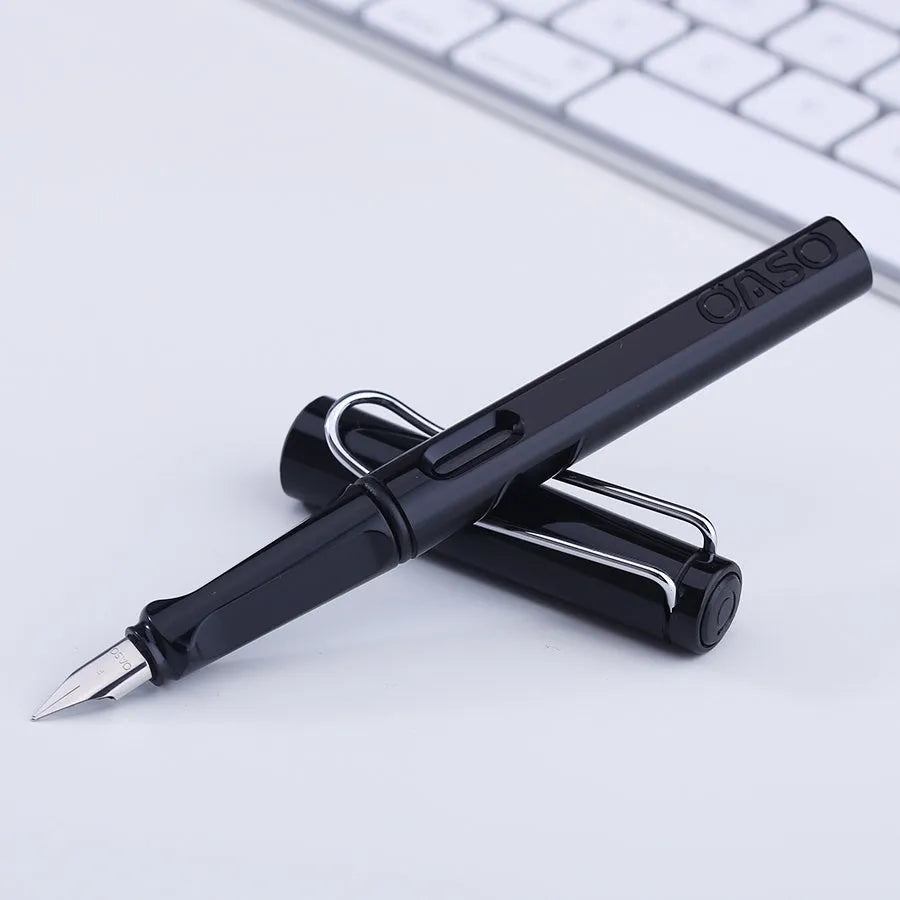 A 0.5mm ink sac pen with a steel nib, plastic shell, and ink bag cartridge visible.