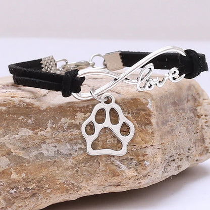 Stylish hand-woven infinite love pet bracelet in various colours, featuring a bow design and made of premium alloy materials