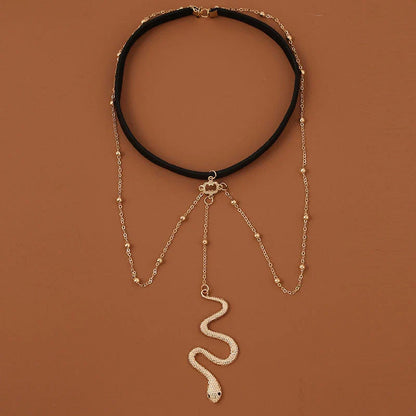 Fashionable gold beaded leg chain with snake pendant for women, featuring a captivating design and adjustable fit for comfortable wear.