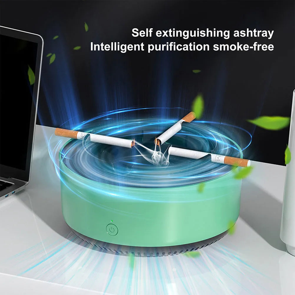 Grey intelligent electronic air purifier ashtray with fan, shown on a desk next to a cigarette.