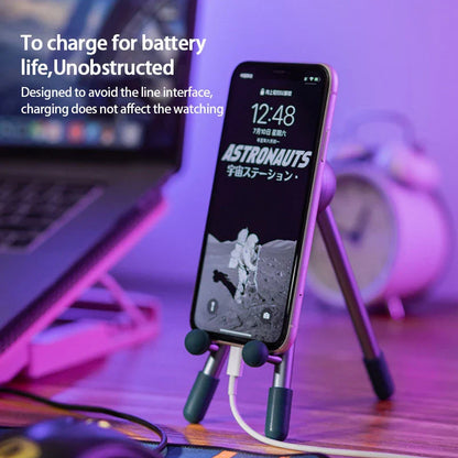Adjustable desk stand in pink and green alien-inspired designs, featuring a mobile phone and tablet holder with 120-degree angle adjustment